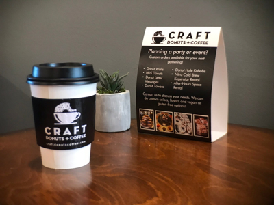 menu and cup sleeve signage Photo