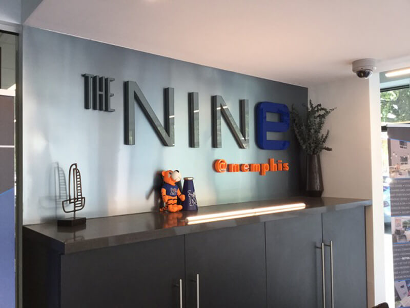 large metal business name with slogan